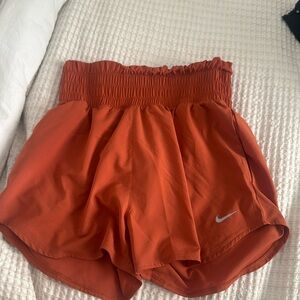 burnt orange Nike size small high waisted shorts